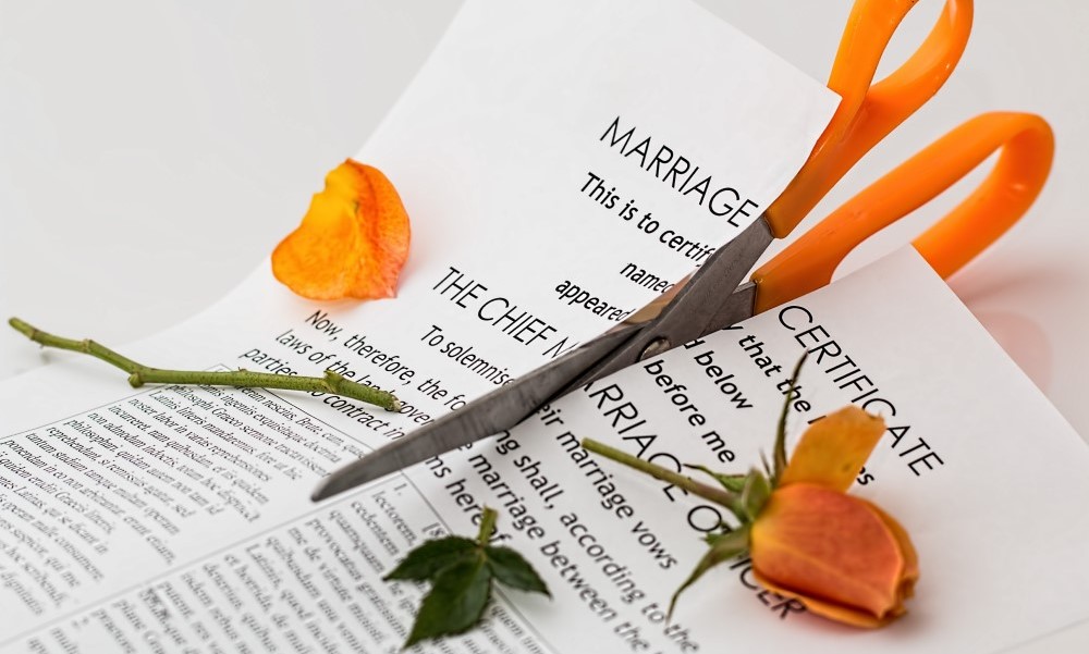 Marriage certificate getting cut in half