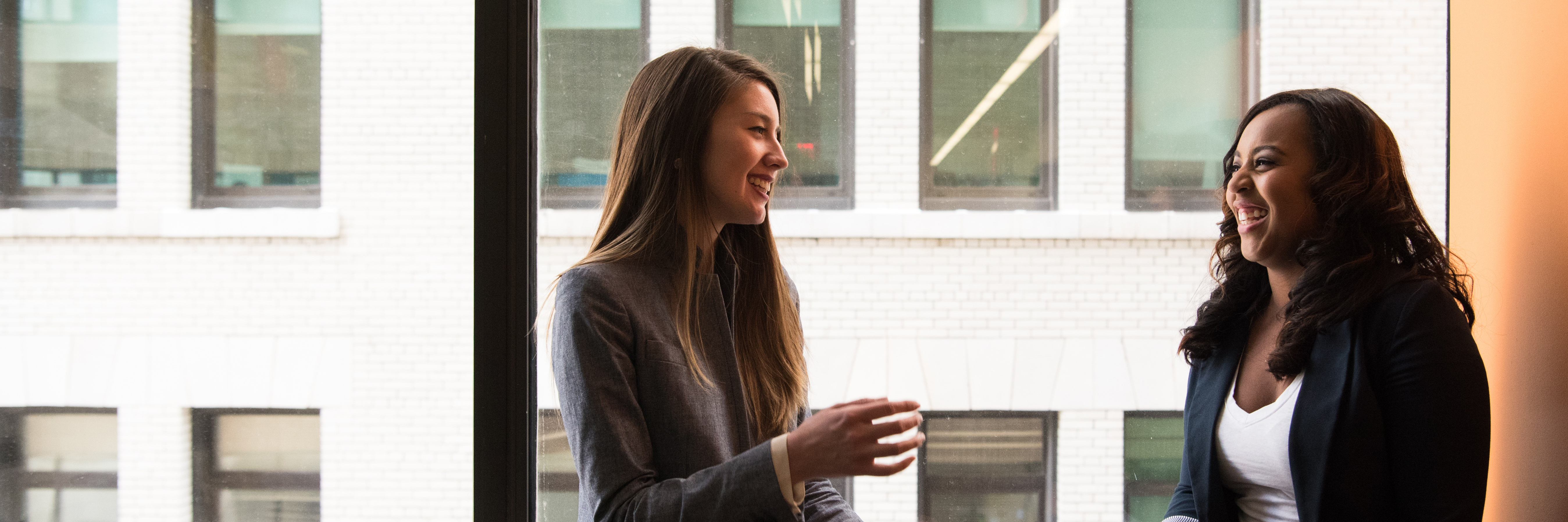 Title background of two women having a conversation